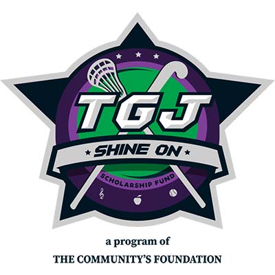 an emblem of a star with a circle circumscribed and lacrosse sticks crossed with overlaid text reading, "TGJ shine on scholarship fund" and small logos of a treble clef, an apple, and baseball beneath it.